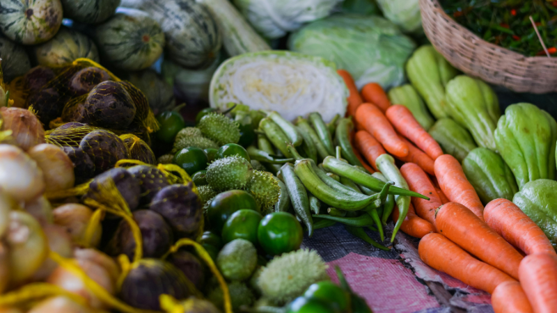 Healthy food list in Indian diet with immunity boosting foods like fruits, vegetables, turmeric, and nuts
