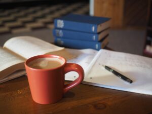 A clean and organized study desk setup showing books, laptop, and stationery, designed to improve focus for studying and help students concentrate better.