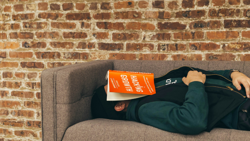 Student feeling sleepy while studying and trying practical ways to stay focused